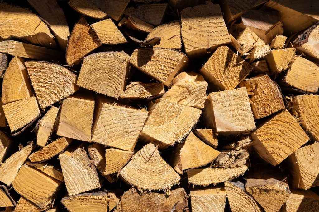 Neatly stacked firewood logs ready for the wood-burning stove